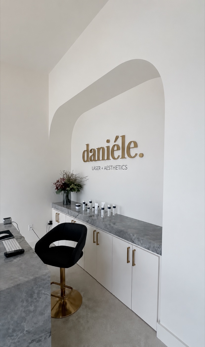 Inside a Daniéle studio — reception and product wall